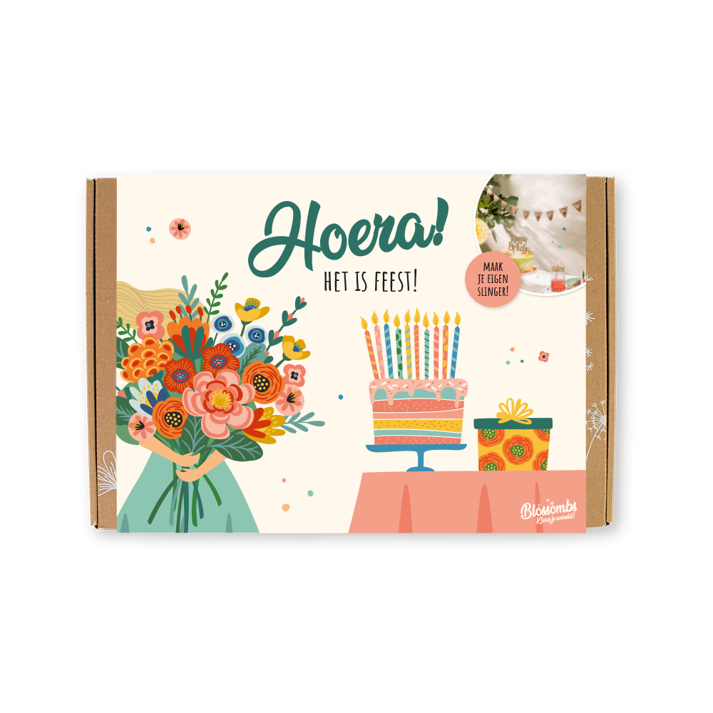 Feestelijke giftbox met Blossombs zaadbommetjes en een vrolijke, gekleurde banderol. Met daarop de tekst: Hoera, het is feest!