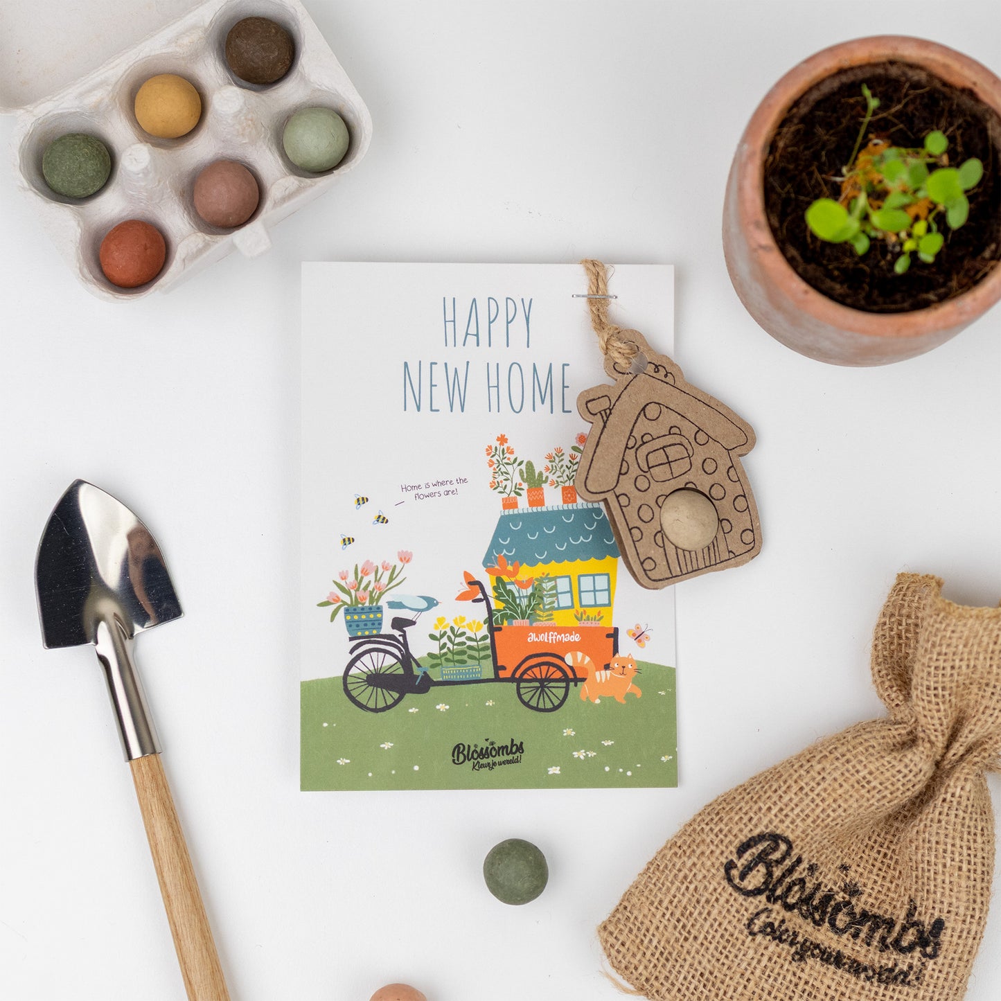 Hanger Huis met zaadbommetje op kaart 'Happy New Home'
